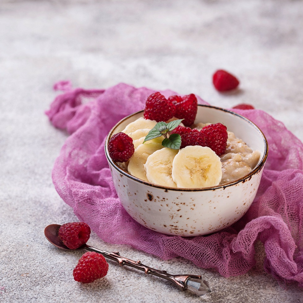 Oatmeal with raspberry and banana. Selective focus